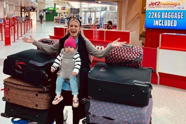 Joanna and her daughter Matylda with the six suitcases full of supplies.