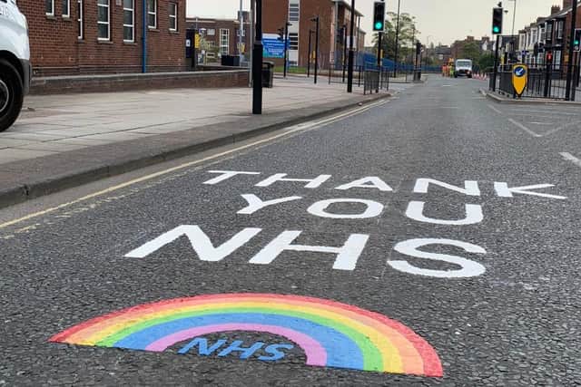 The finished message mapped out on the A183 Chester Road, outside the entrance to Sunderland Royal Hospital, by Sunderland City Council.