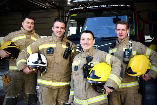 Megan with (from left) Firefighter Harry Hayward, Watch Manager Steven Walker and Firefighter Bradley Clough