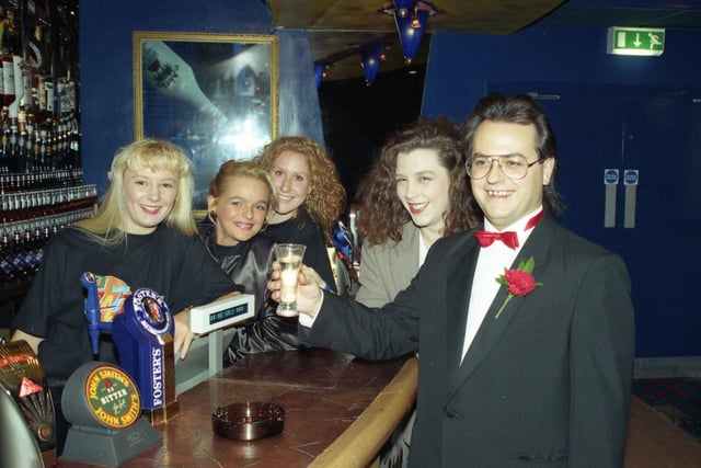 Alright, we know Pzazz doesn't begin with a "Z" - but it does end with a couple so that's good enough for us. Manager Paul Klein is pictured here with staff as they toast the Holmeside nightclub's 1994 opening.