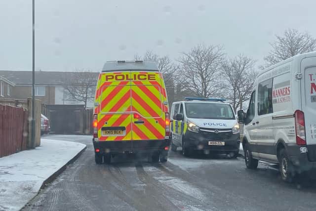 Police vehicles have been seen in the area following the assault.