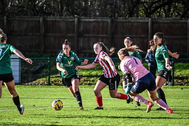 Jessica Brown fights for the ball in the Lewes box. Picture: Chris Fryatt.
