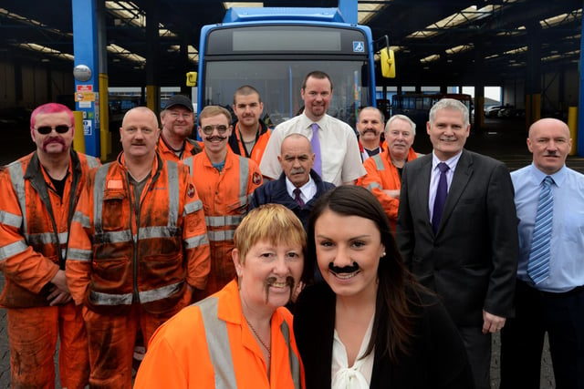 Staff at the Stagecaoch depot during Movember 2014. Pictured front are Irene Kyle (left) and Rebecca Ellis.