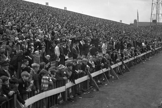 With the summer holidays comes the pre-season and then, of course, the season proper! Crowds pictured at Roker Park in August 1964.