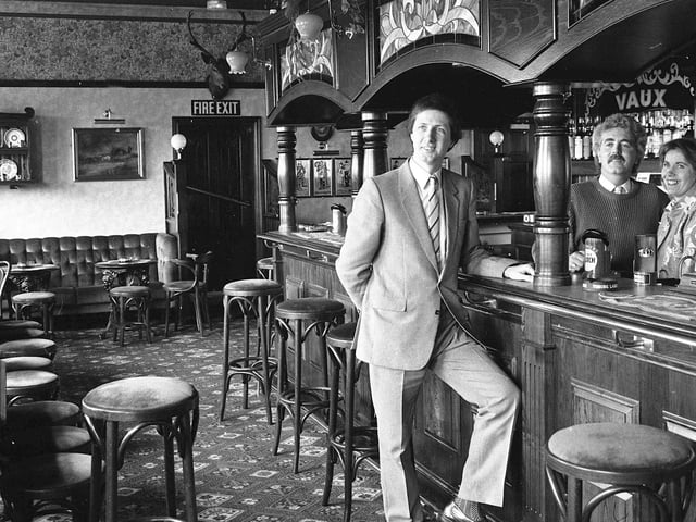 Tenants Mr and Mrs Jim Foley, with Mr David Fortune, Vaux district sales manager, in the refurbished bar of the Beehive at Houghton.