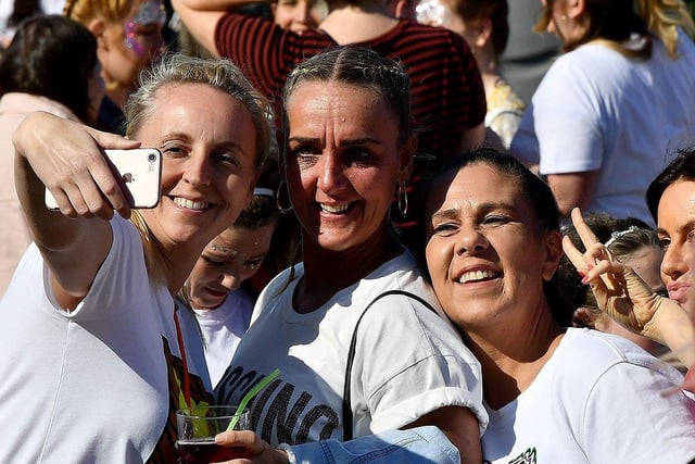 Tell you what we want. Your 2019 memories of fans posing for a selfie as they made their way to the Stadium of Light for the Spice Girls concert in 2019.