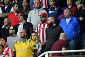 Sunderland players and fans observe silence