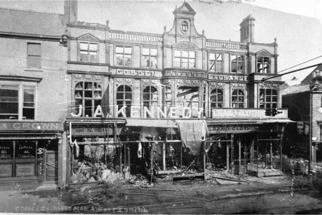 The burned out store in 1904.