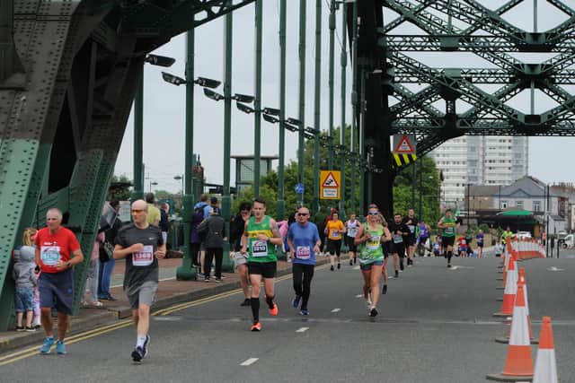 Runners head over the Wearmouth Bridge as part of the Sunderland City Runs 10k.