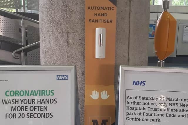 A hand sanitiser dispenser at Sunderland's Park Lane transport interchange.