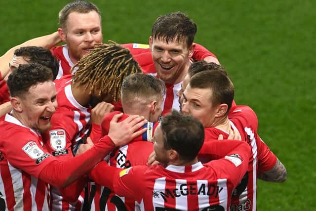 Sunderland striker Charlie Wyke and his team-mates celebrate after scoring against Swindon.
