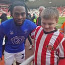 Jack with Luton Town FC player Fred Onyedinma.