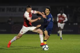 BOREHAMWOOD, ENGLAND - MARCH 29: Danny Ballard of Arsenal tackles Nathan Holland of West Ham United during the Premier League 2 match between Arsenal U23 and West Ham United U23 at Meadow Park on March 29, 2019 in Borehamwood, England. (Photo by Alex Burstow/Getty Images)