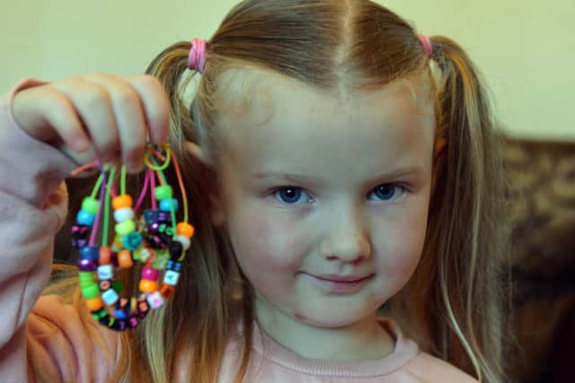 Younster Eve Richardson, 5 with her self made bracelets to raise funds for Pallion food bank.