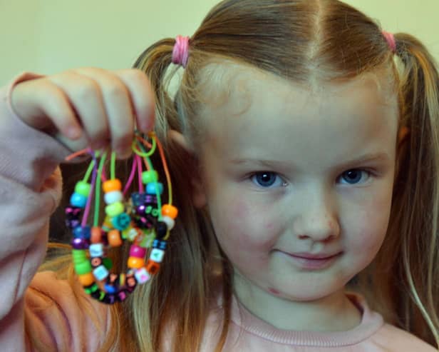 Younster Eve Richardson, 5 with her self made bracelets to raise funds for Pallion food bank.