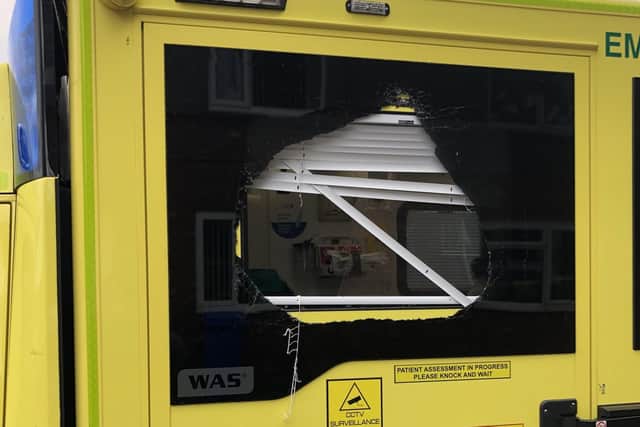 Undated handout photo from the Twitter feed of the North East Ambulance Service NHS Foundation Trust of damage to an ambulance which was attacked over the weekend. Picture: PA.