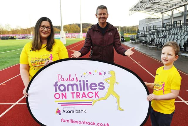 Steve Cram with Emma Lumley and her son George (7) at the launch of the Durham City run festival held at Maiden Castle. Picture by FRANK REID