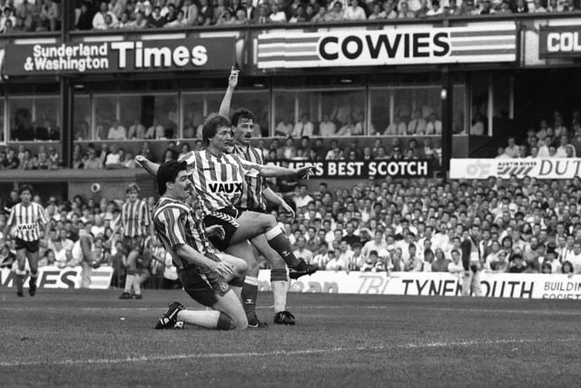 Newcastle striker Mick Quinn is on defensive duty as Eric Gates gets in a shot for Sunderland in the derby match at Roker Park.