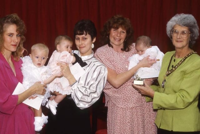 The Mayoress of Sunderland, Mrs Eleanor Myers hands prizes to Sandra Curry with baby Vanessa Louise; Maria Blacklin with baby Rachel Louise; and Christine Ellison with baby Victoria.