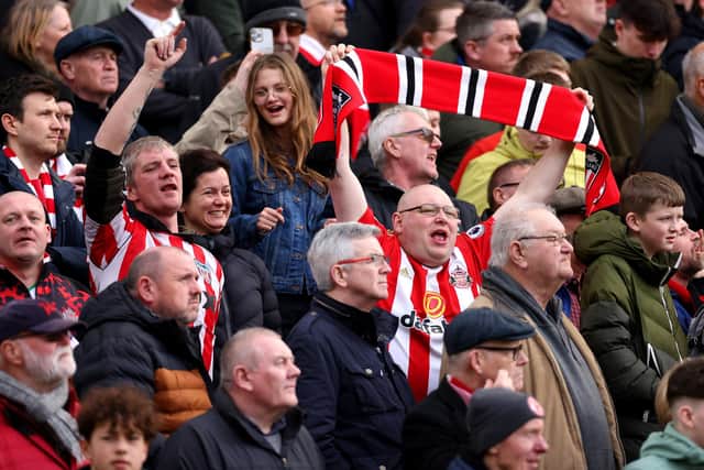 NORWICH, ENGLAND - MARCH 12: Sunderland fans celebrate victory following the Sky Bet Championship match between Norwich City and Sunderland at Carrow Road on March 12, 2023 in Norwich, England. (Photo by Stephen Pond/Getty Images)