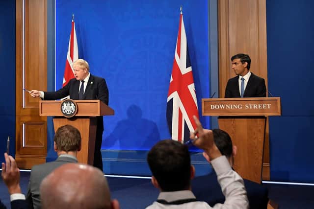 Prime Minister Boris Johnson and Chancellor of the Exchequer Rishi Sunak,during a media briefing in Downing Street on the long-awaited plan to fix the social care system. Photo: Toby Melville/PA Wire