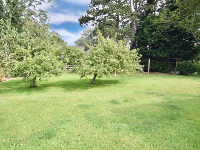 The property is set in about six acres of land.