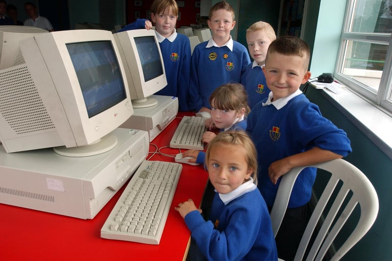 Pupils were pictured with their new computers in a flashback photo from 16 years ago. Remember it?