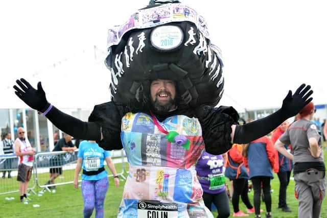 Colin Burgin-Plews, aka the Big Pink Dress, in one of his handcrafted creations after completing the Great North Run 2018.