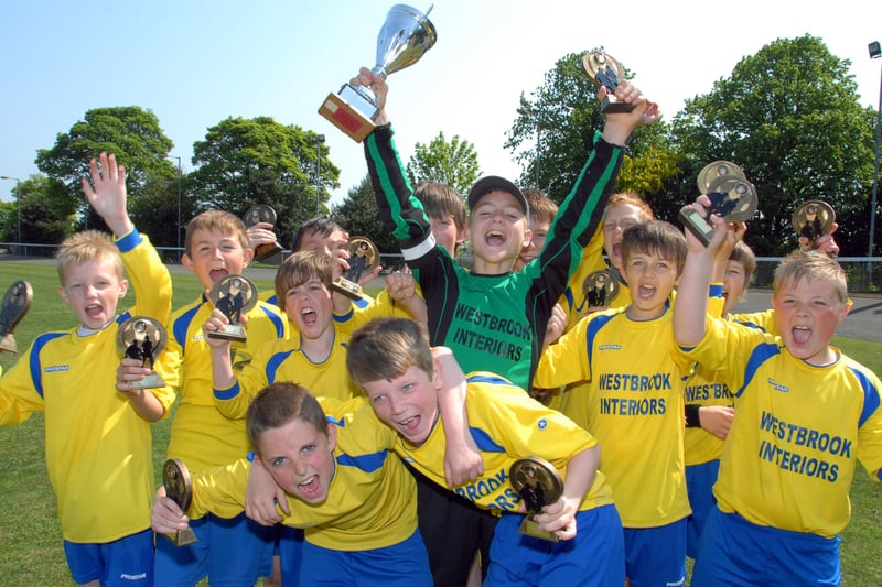 Woodhouse Colts celebrate a 2-1 extra-time win over Robin Hood Colts in the 2013 finals.