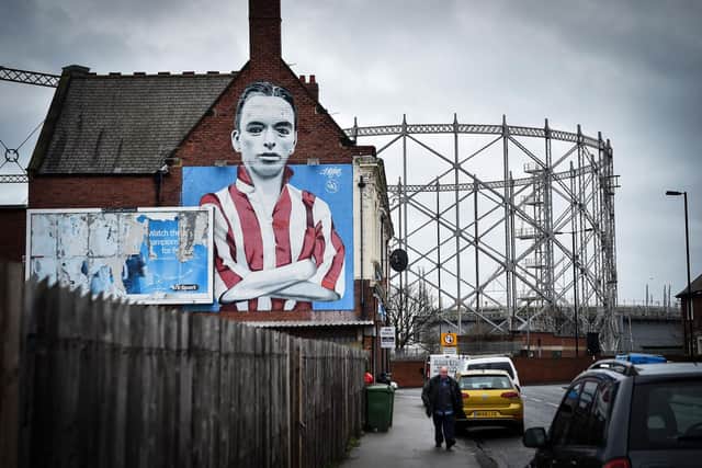 A mural is pictured showing the Sunderland football legend Raich Carter, painted by Frank Styles on the side of the Blue House public house in Hendon.