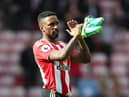 Jermain Defoe applauds the fans at the end of the match during the Premier League match between Sunderland and Swansea City