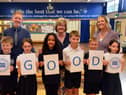 (left to right) Headteacher Tim Shenton, Chair of Governors Maureen Skevington and Deputy Headteacher Kaye Seebacher celebrate the school's good Ofsted report with some of the pupils.