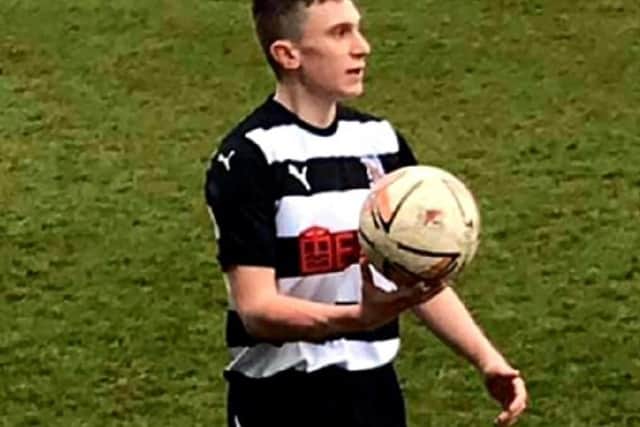 Harvey playing football for Darlington FC Academy.