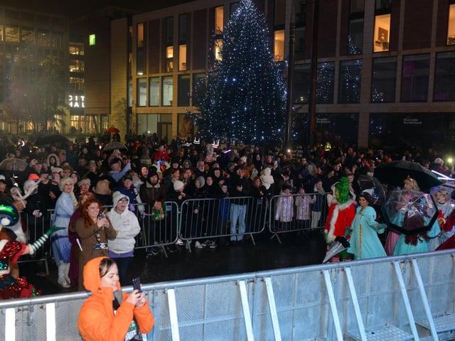 The Christmas tree was shining bright.