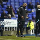 Reading manager Paul Ince (left) instructs his players. PA.