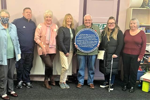 Members of Southwick Village Green Preservation Society have received the new plaque