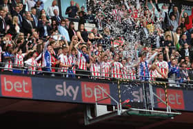 Sunderland players with the League One play-off trophy. Picture by FRANK REID