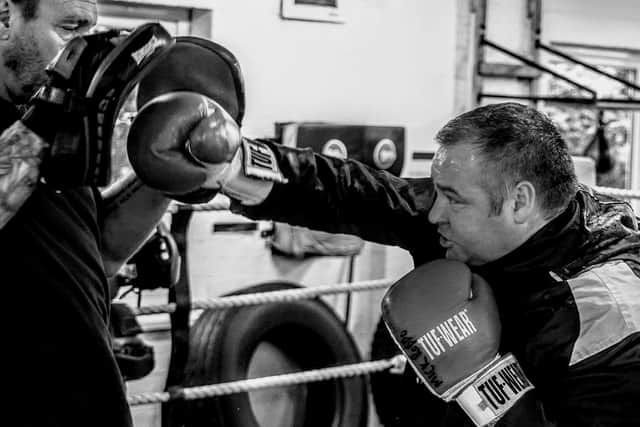 Michael ran Plains Farm Amateur Boxing Club, teaching a younger generation how to box.