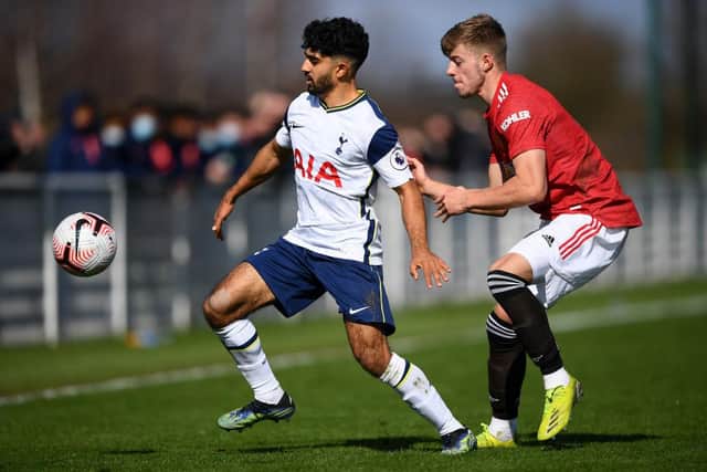 Dilan Markanday of Tottenham Hotspur battles for possession with Ethan Galbraith.