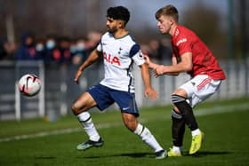 Dilan Markanday of Tottenham Hotspur battles for possession with Ethan Galbraith.
