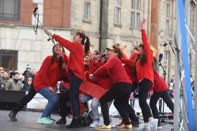 Sunderland University students taking a selfie on stage at their Chinese New Year celebrations in Keel Square in 2019.