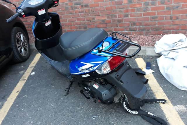 The damaged moped which was the subject of the alleged attempted theft.