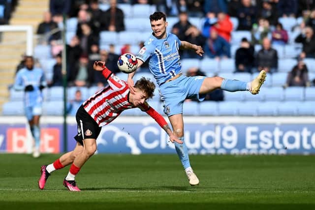 Jack Clarke is challenged at Coventry City