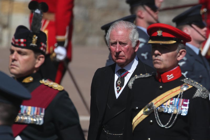 The Prince of Wales walking in the procession to St George's Chapel ahead of Prince Philip's funeral which started after a national minute's silence at 3pm.