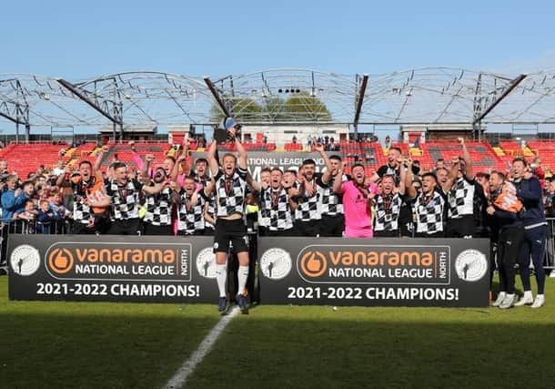 Greg Olley lifts the National League North trophy for Gateshead FC (photo: Charles Waugh).