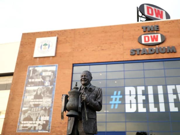 WIGAN, ENGLAND - SEPTEMBER 21: General view outside of the stadium displaying a statue of Dave Whelan ahead of the Carabao Cup Third Round match between Wigan Athletic and Sunderland at DW Stadium on September 21, 2021 in Wigan, England. (Photo by Jan Kruger/Getty Images)