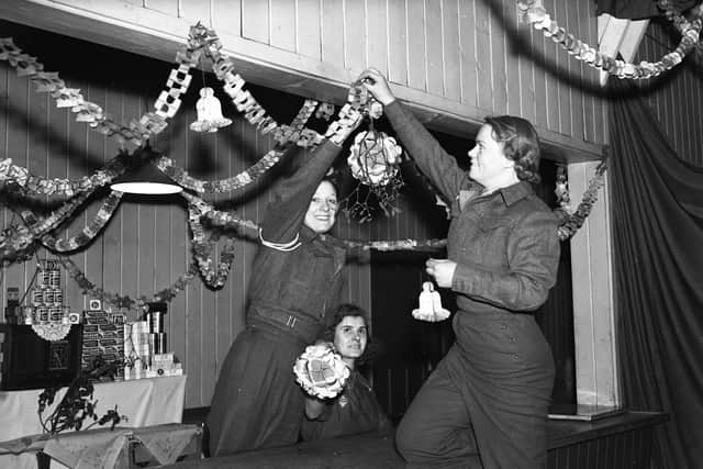 ATS girls stationed on Wearside decorate the canteen for their Christmas festivities in 1941.
