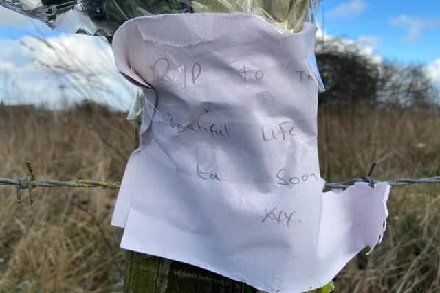 A note left in tribute to the woman who died in the collision.