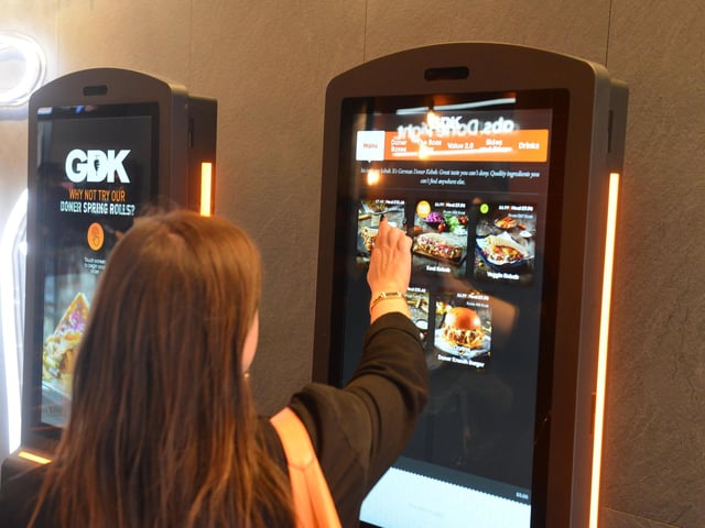 As well as ordering at the till for sit-in or take away, there's self ordering machines.