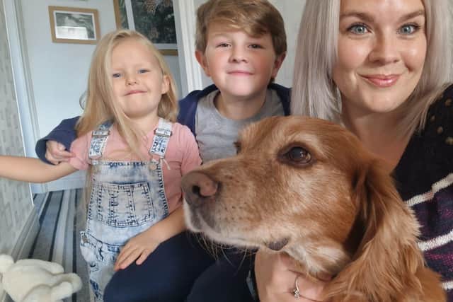 A family photo of Indi at home with Emma, Oliver and Rose.